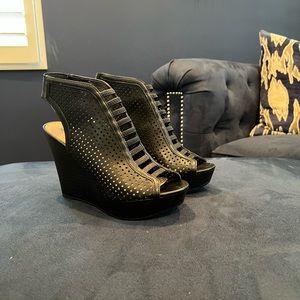 Comfortable black wedge heels. Wore once.